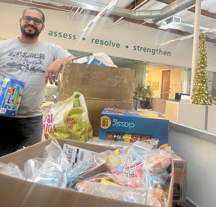 WOSMOH representative picking up the items donated by Citadel EHS employees. Citadel Cares asked for items to be donated for Christmas bags to disadvantaged youth.