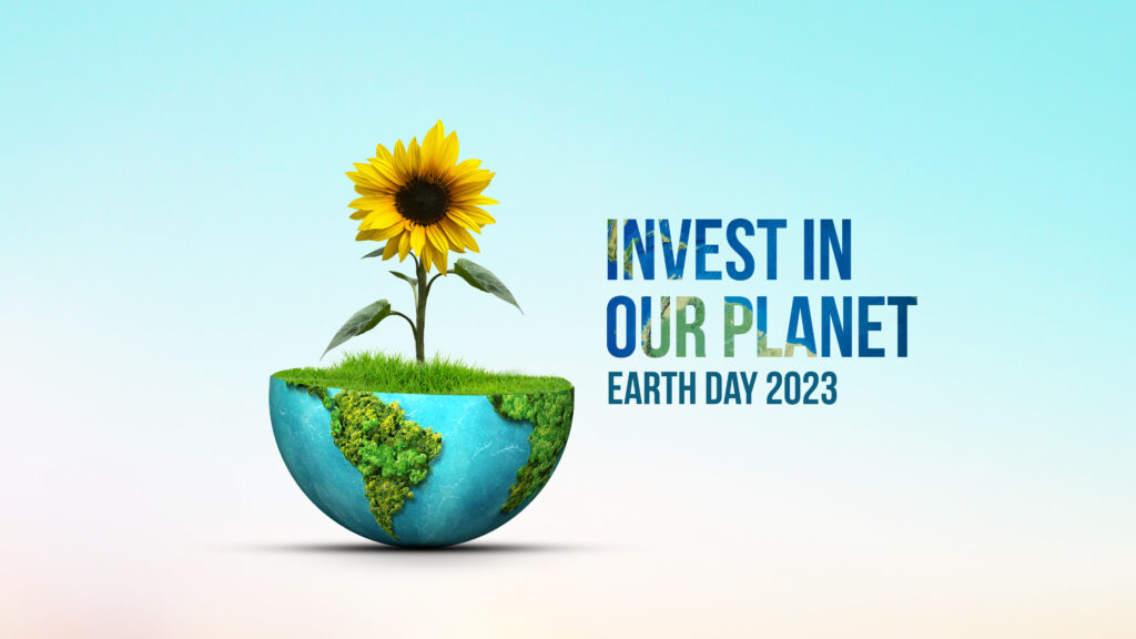 An illustration of a sunflower growing out of a secmi circle of the Planet earth with the words "invest in our planet" as a reference to Citadel's ESG and Sustainability practice, in addition to celebrating Earth Day as part of Citadel EHS company sustainability values named the Citadel Green Promise.