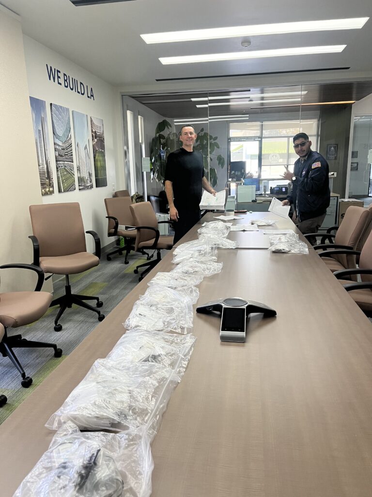 An image of Citadelians Jorge Romero and Jim Bernardino plotting samples of suspected asbestos containing material as part of a demolition level Environmentally regulated materials survey.
